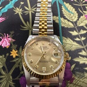 Faux Rolex.  Good used condition. I did have it tested. It is not a real Rolex